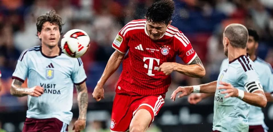 Player heading the ball during a soccer match