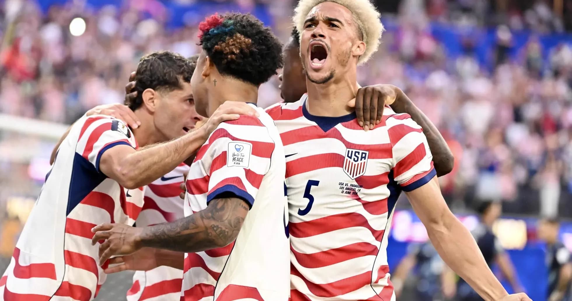 USA players celebrating a goal during match