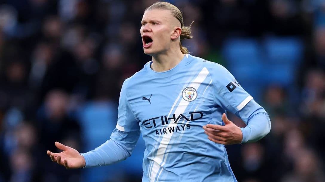 Player gesturing during a match for Manchester City
