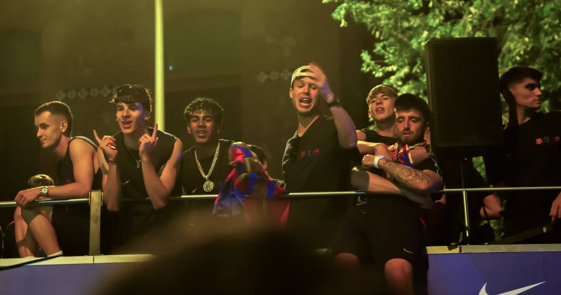 Group of young fans celebrating at event