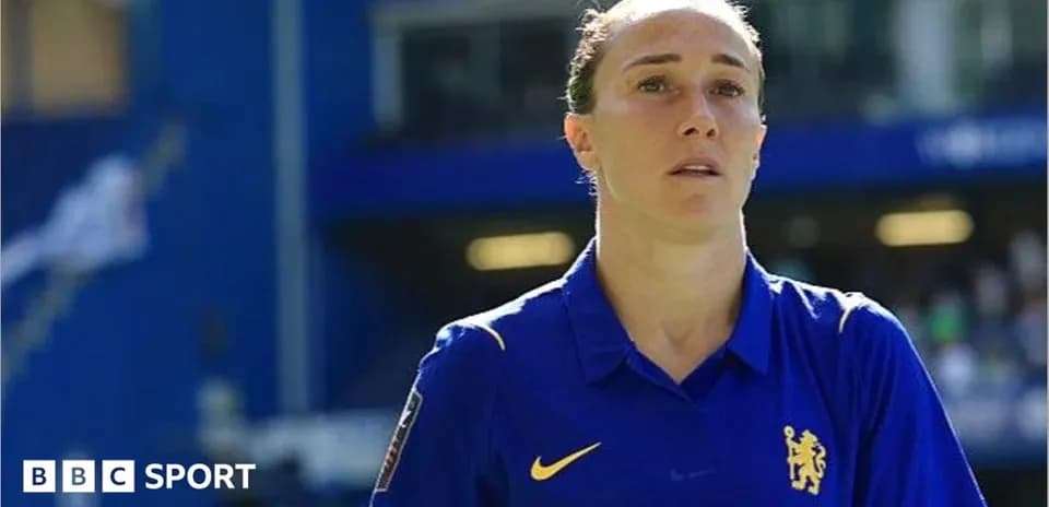 Female player in Chelsea kit on the pitch