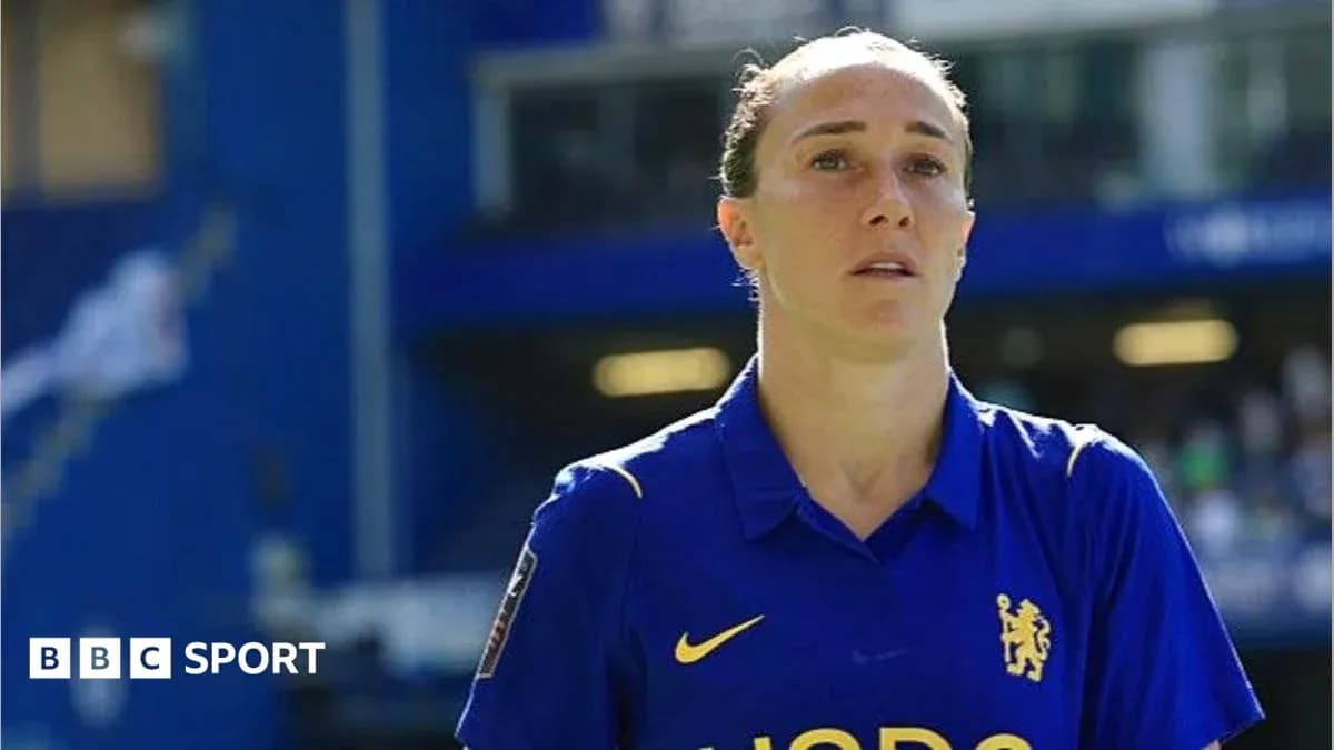 Female player in Chelsea kit on the pitch