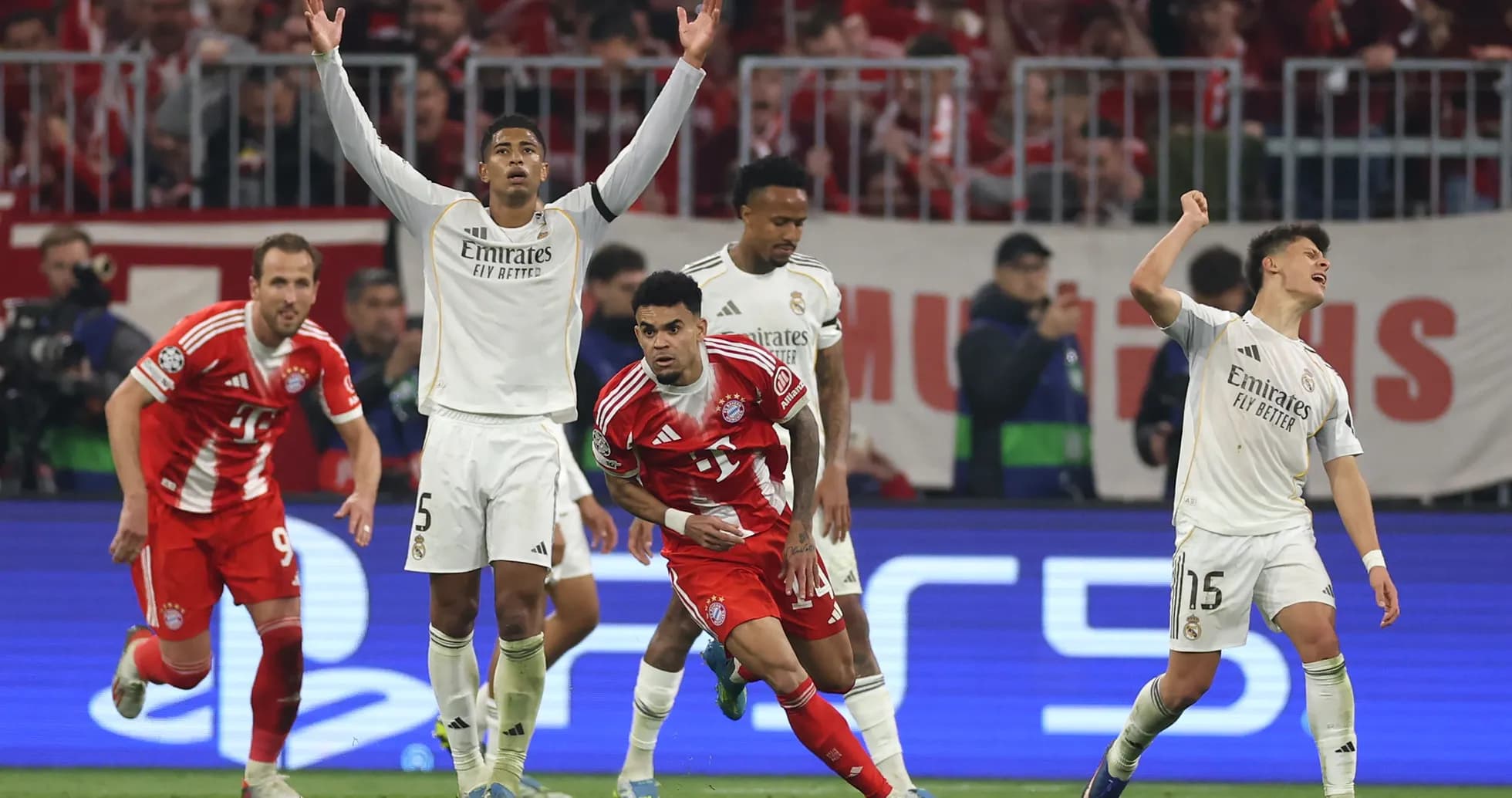 Players celebrating during Bayern vs Real Madrid match