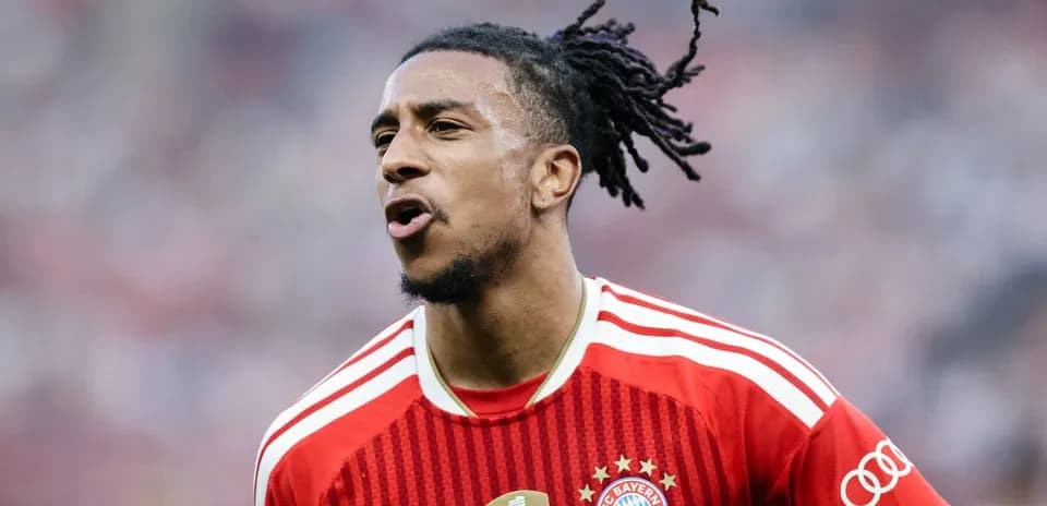 Player celebrating in Bayern Munich jersey on field