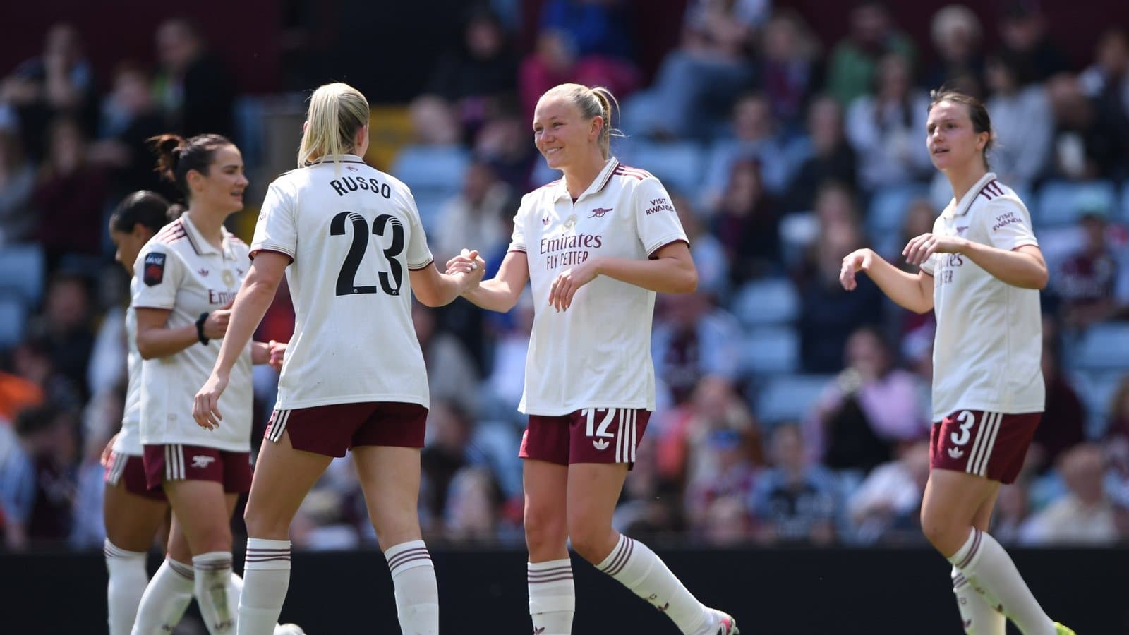 Arsenal women celebrating during a match