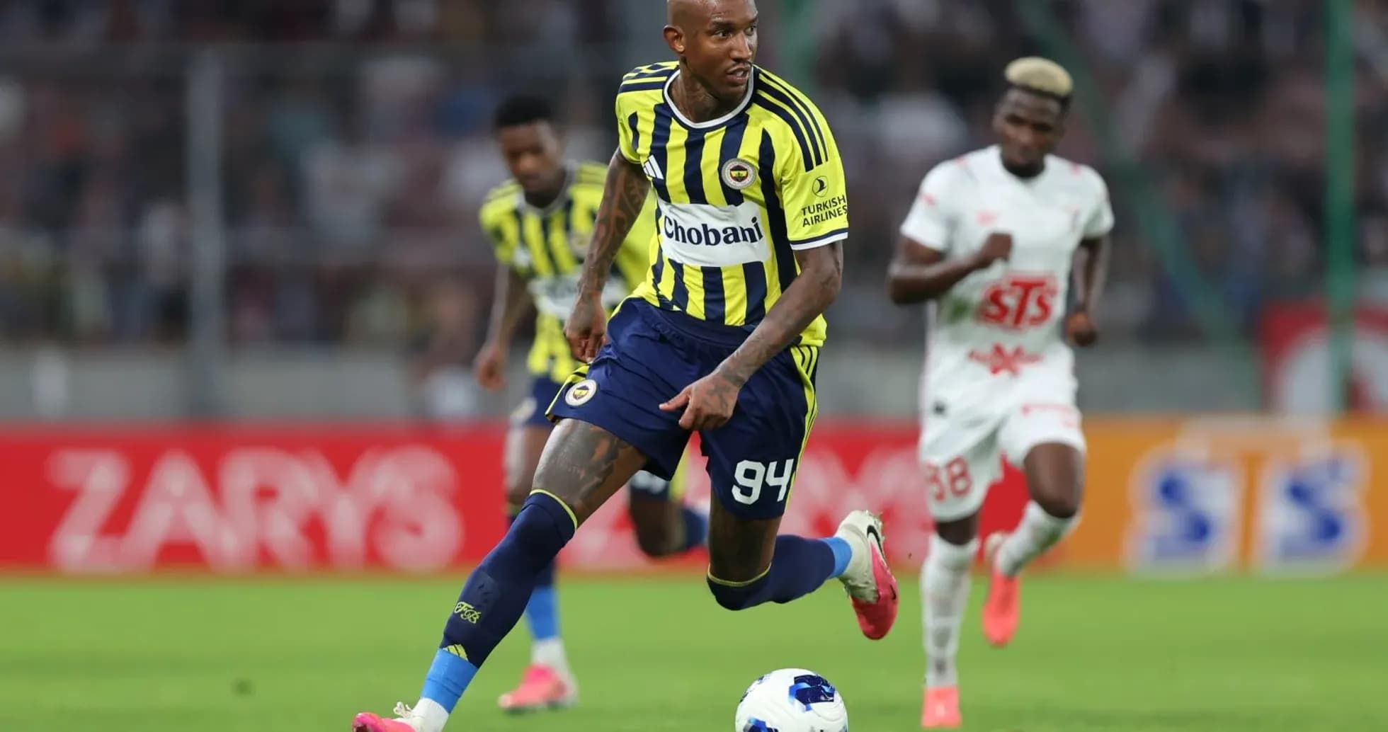 Fenerbahçe player dribbling the ball during match