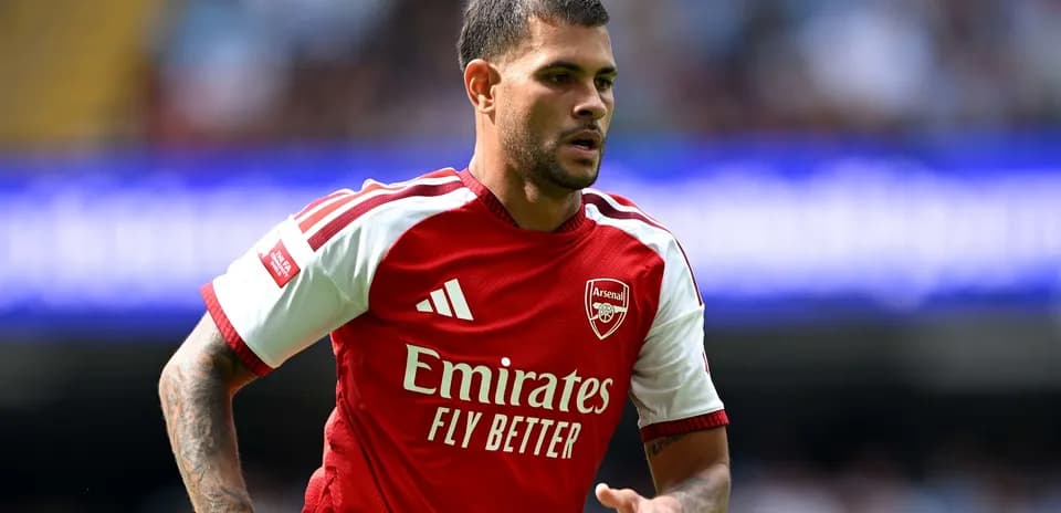 Arsenal player running during Premier League match