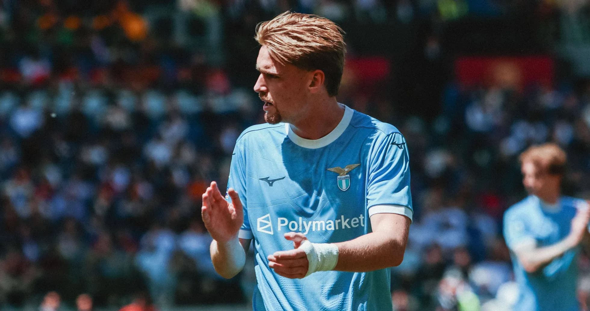 Lazio player clapping during match on the field