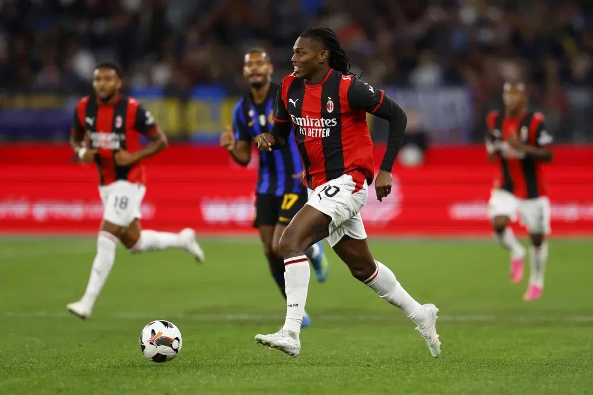 AC Milan player running with the ball during match