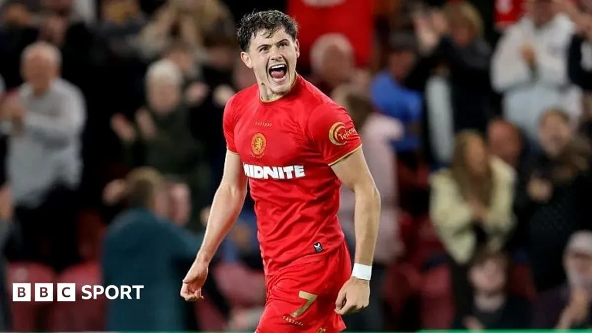 Player celebrating after scoring a goal in match