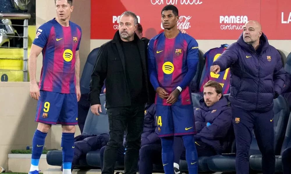 Barcelona players and coaching staff on the bench