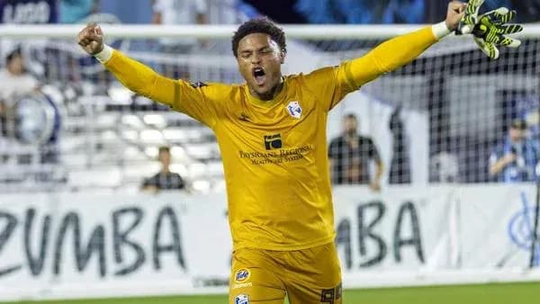 Goalkeeper celebrating a save during a match