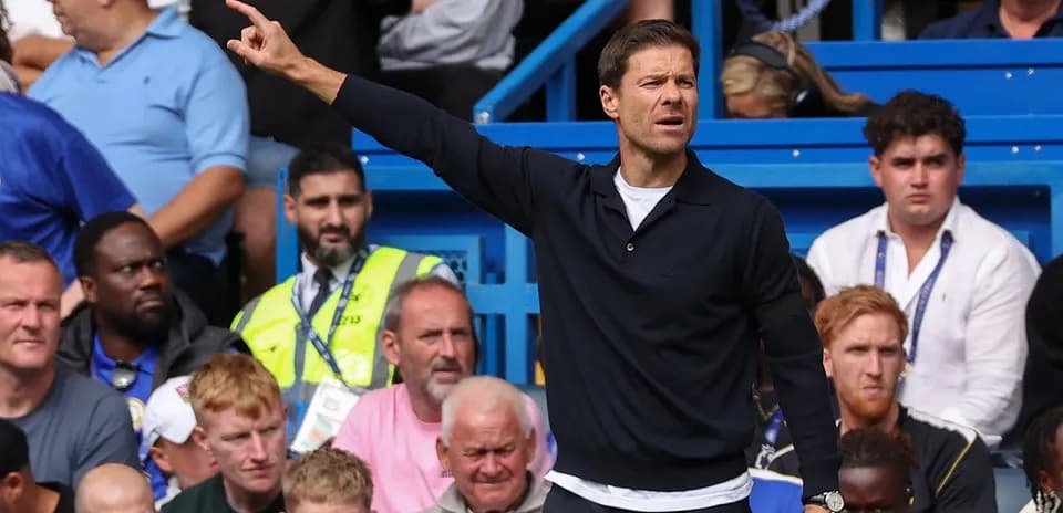 Coach giving instructions during match from sidelines