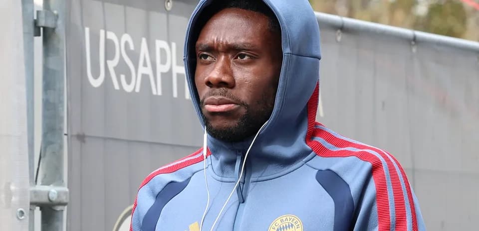 Player wearing Bayern Munich hoodie with headphones