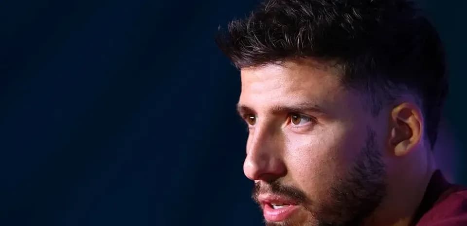 Player speaking during press conference with media