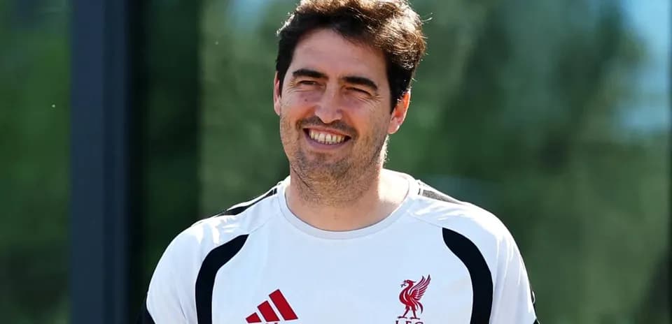 Coaching staff member at Liverpool training session