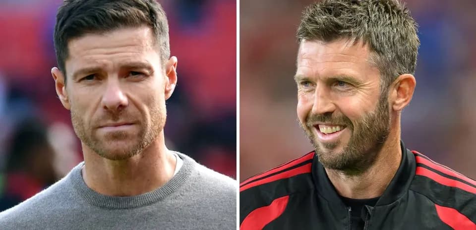 Two football managers posing for photos side by side