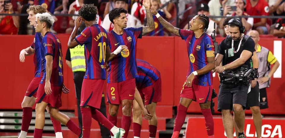 Barcelona players celebrating a goal during match