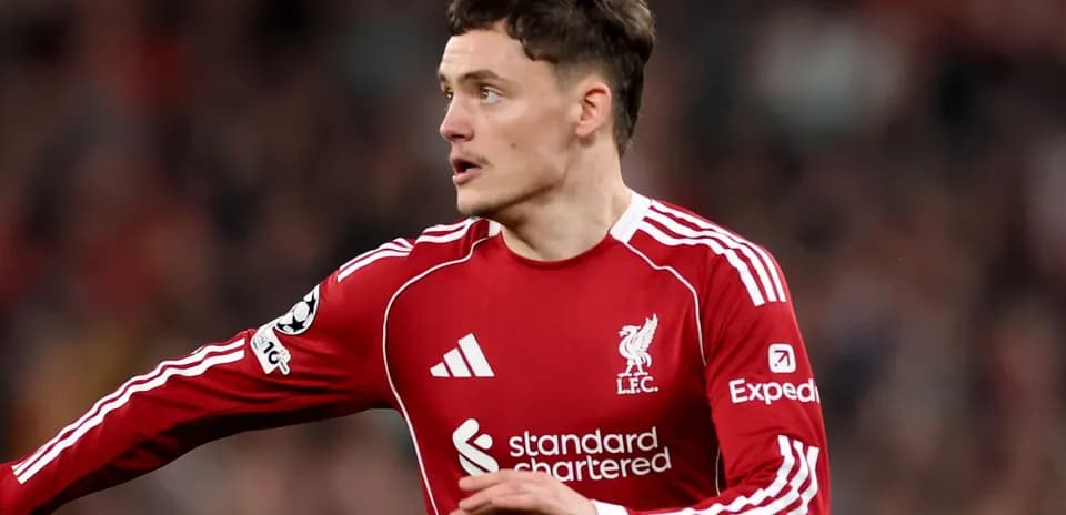 Player in Liverpool kit during match action