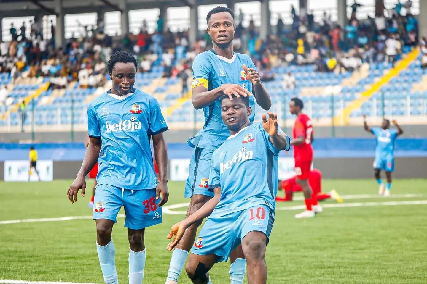 Warri Wolves players celebrating a goal