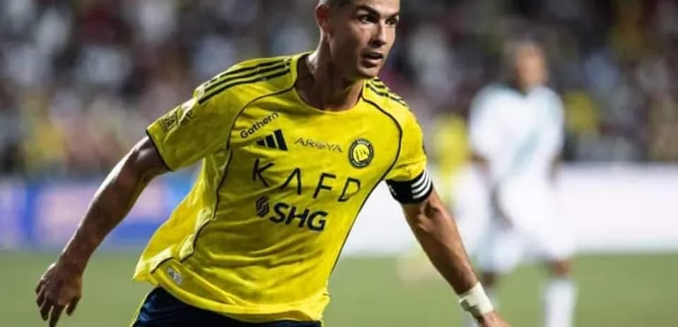 Player in yellow jersey celebrating during match
