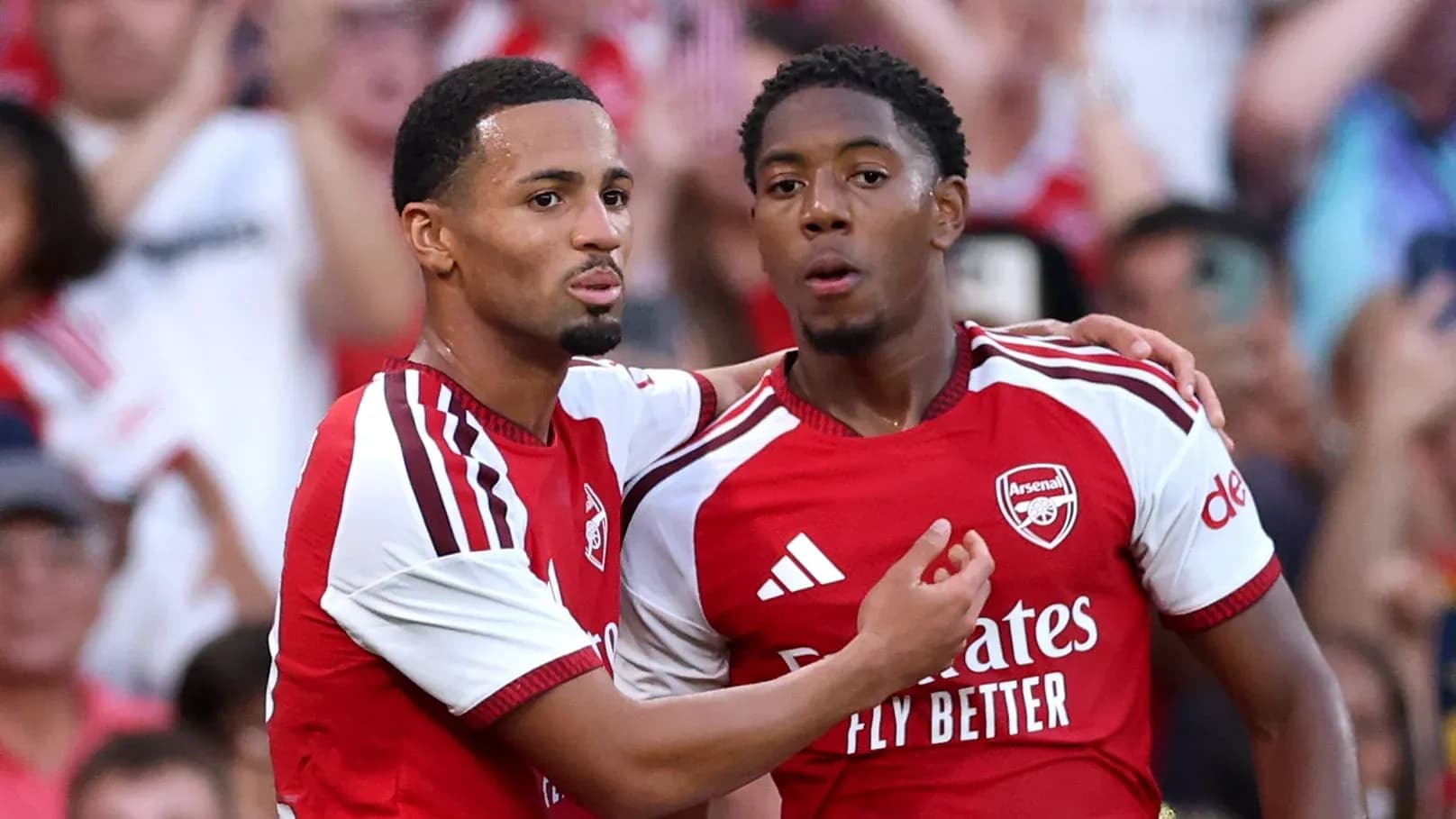 Arsenal players celebrating a goal together