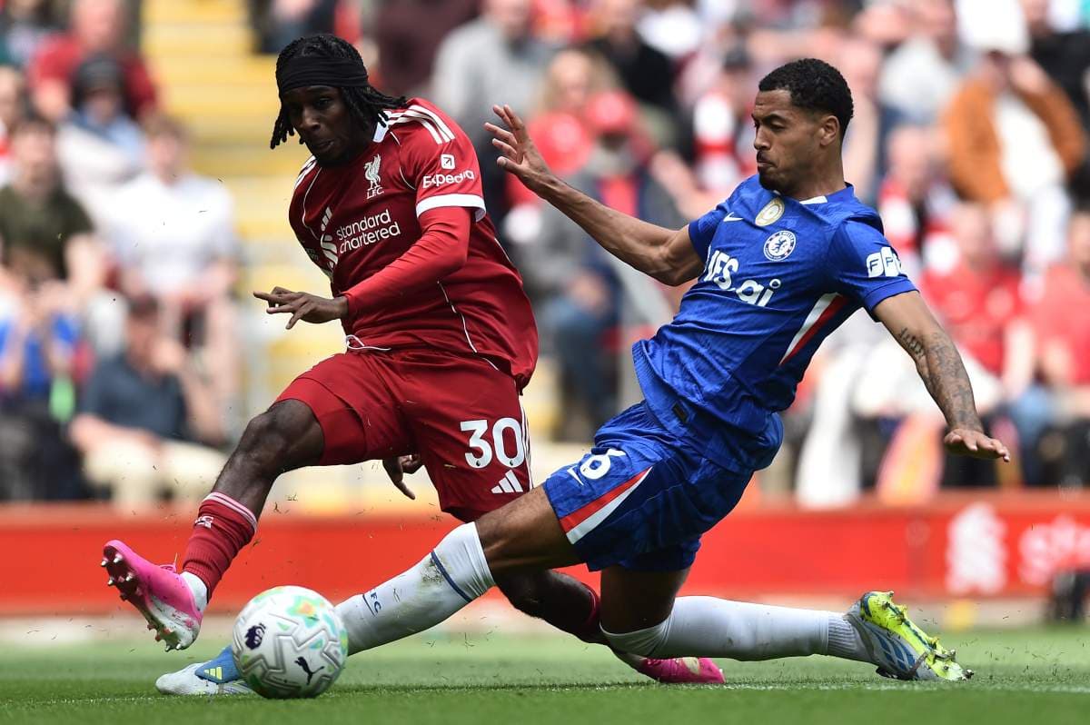 Two players contesting for the ball during match