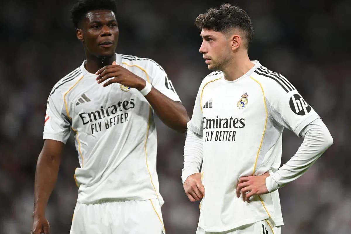 Two Real Madrid players discussing on the pitch
