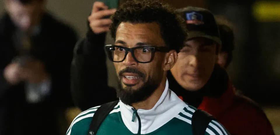 Player wearing glasses in team training gear