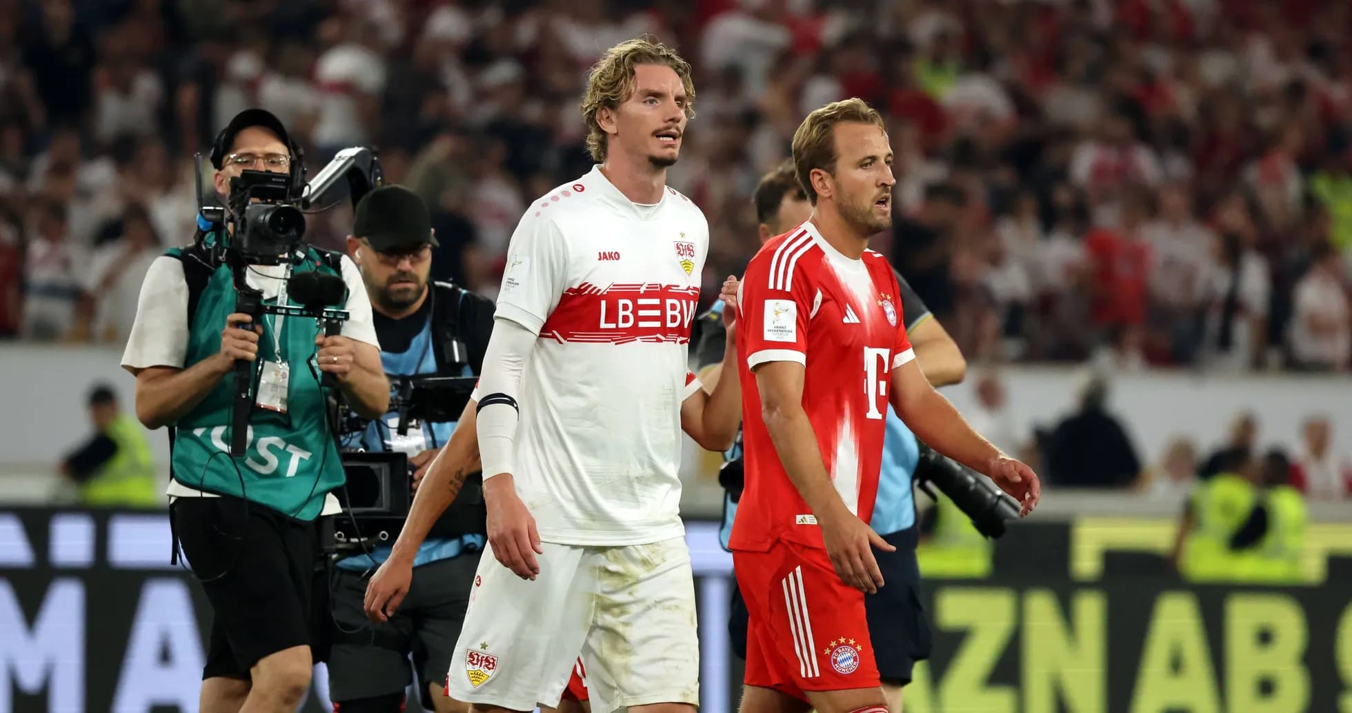Players walking off the pitch after the match