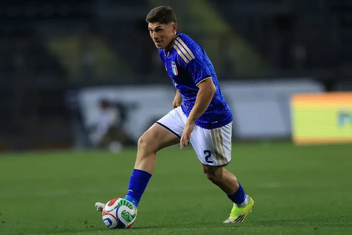 Player dribbling the ball on the field