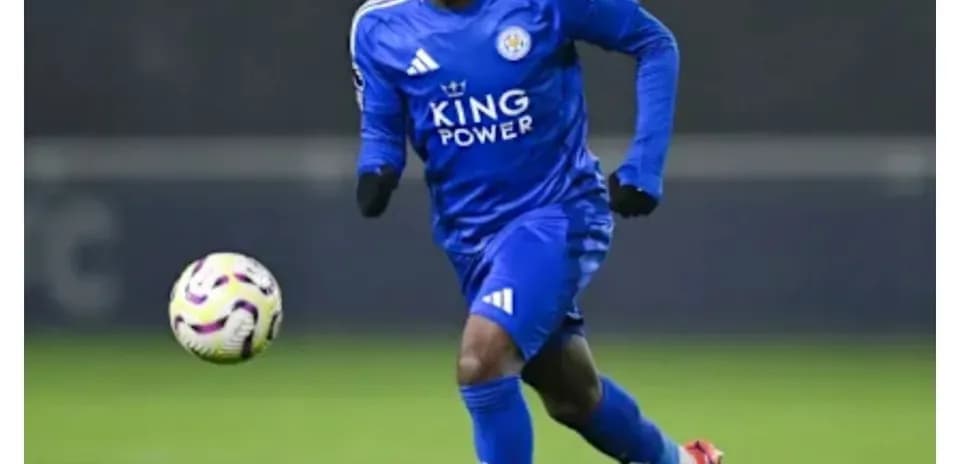 Player running with ball during training session