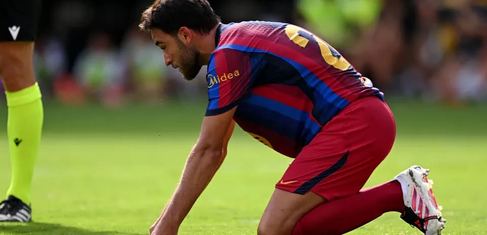 Player kneeling on the field during a match