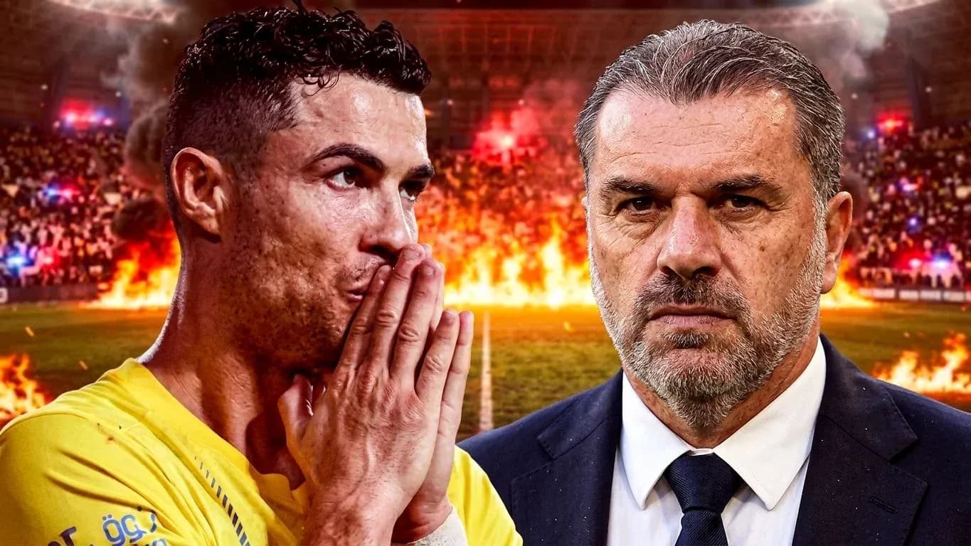Cristiano Ronaldo and coach facing intense stadium atmosphere