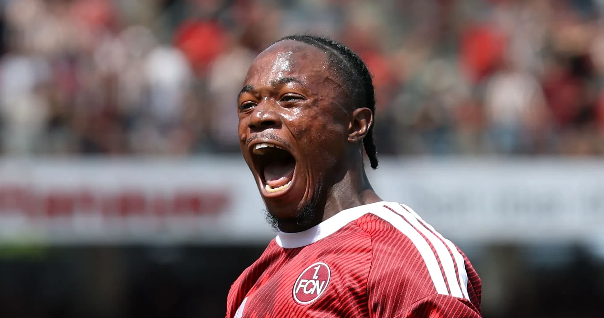Player celebrating a goal with a loud shout