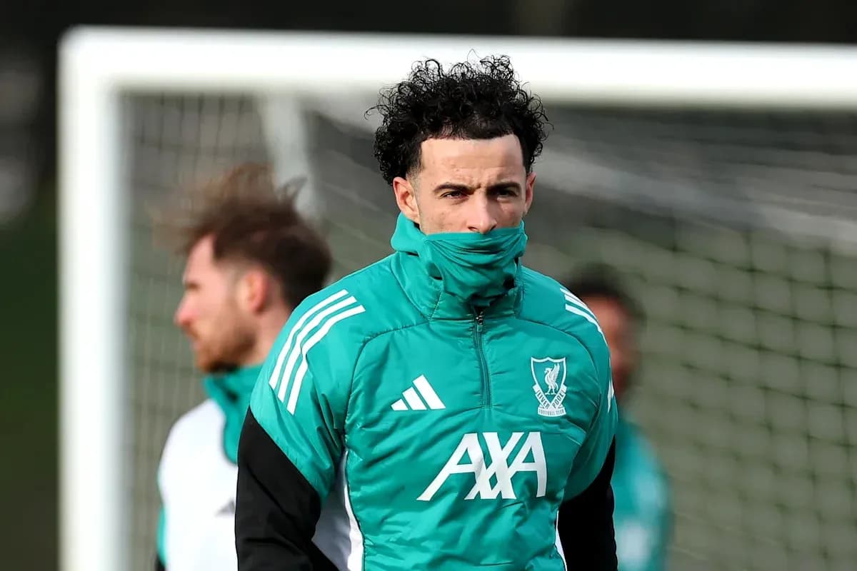 Player training in Liverpool kit during practice session