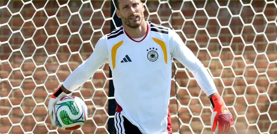 Goalkeeper holding ball during training session