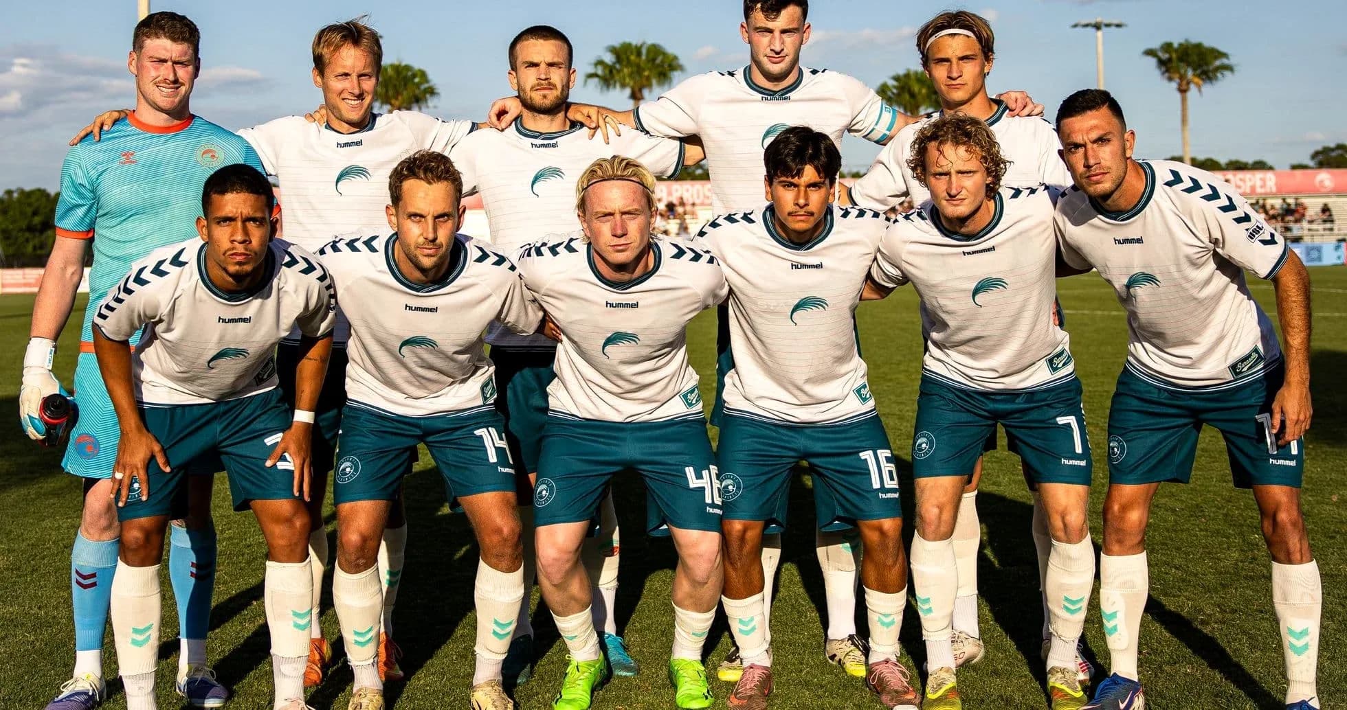 Naples team posing for photo before match