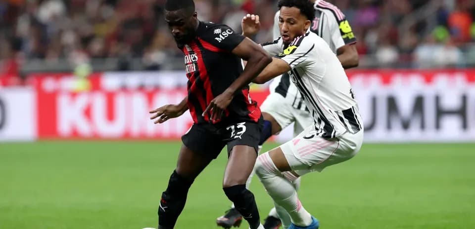 Player tackling during Juventus vs AC Milan match