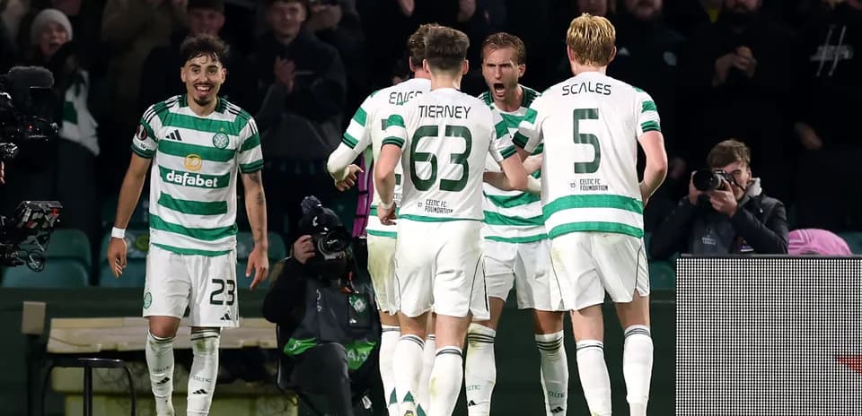 Celtic players celebrating a goal during match
