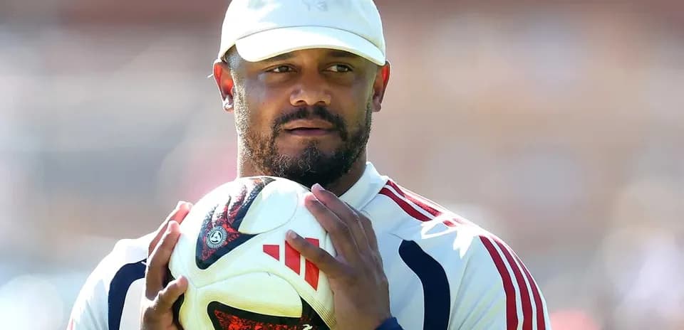Player holding a soccer ball during practice