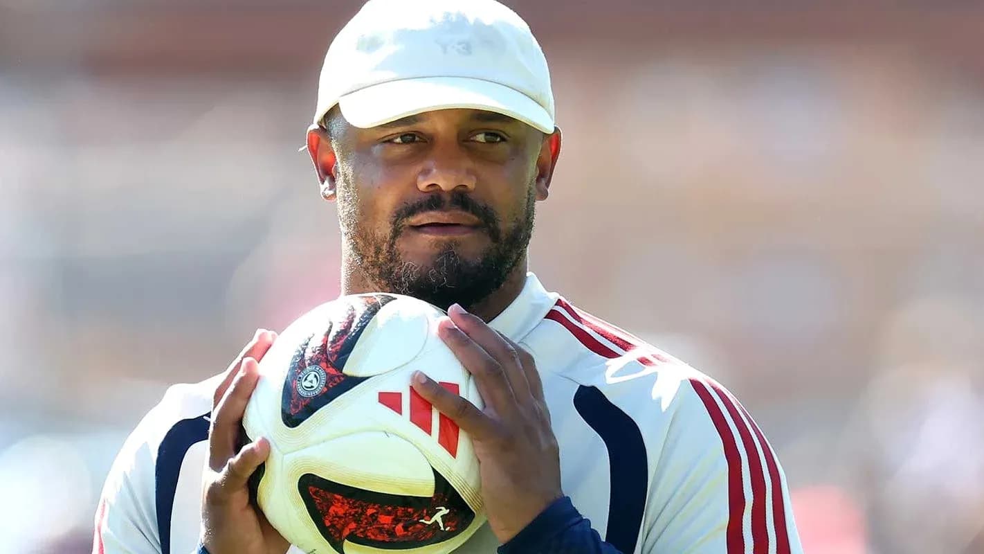 Player holding a soccer ball during practice