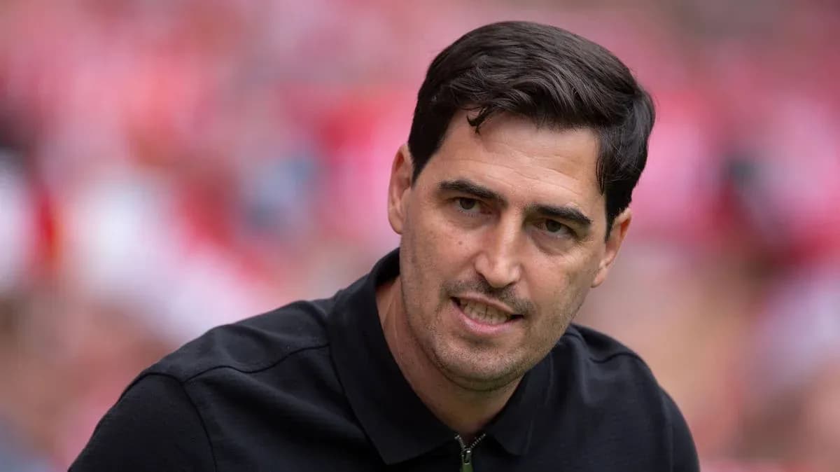 Coach speaking during match warm-up on sidelines