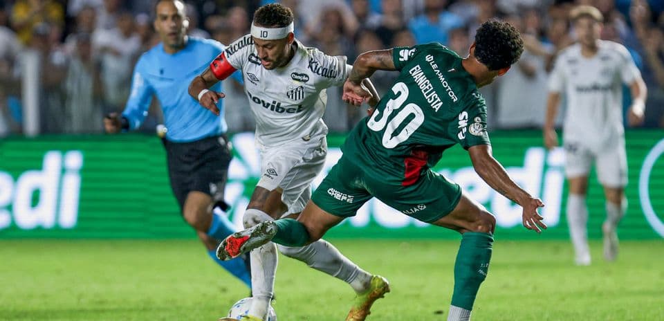 Player dribbling past opponent during a match