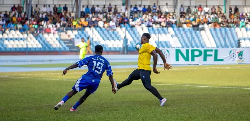 Goalkeeper saving a shot during NPFL match