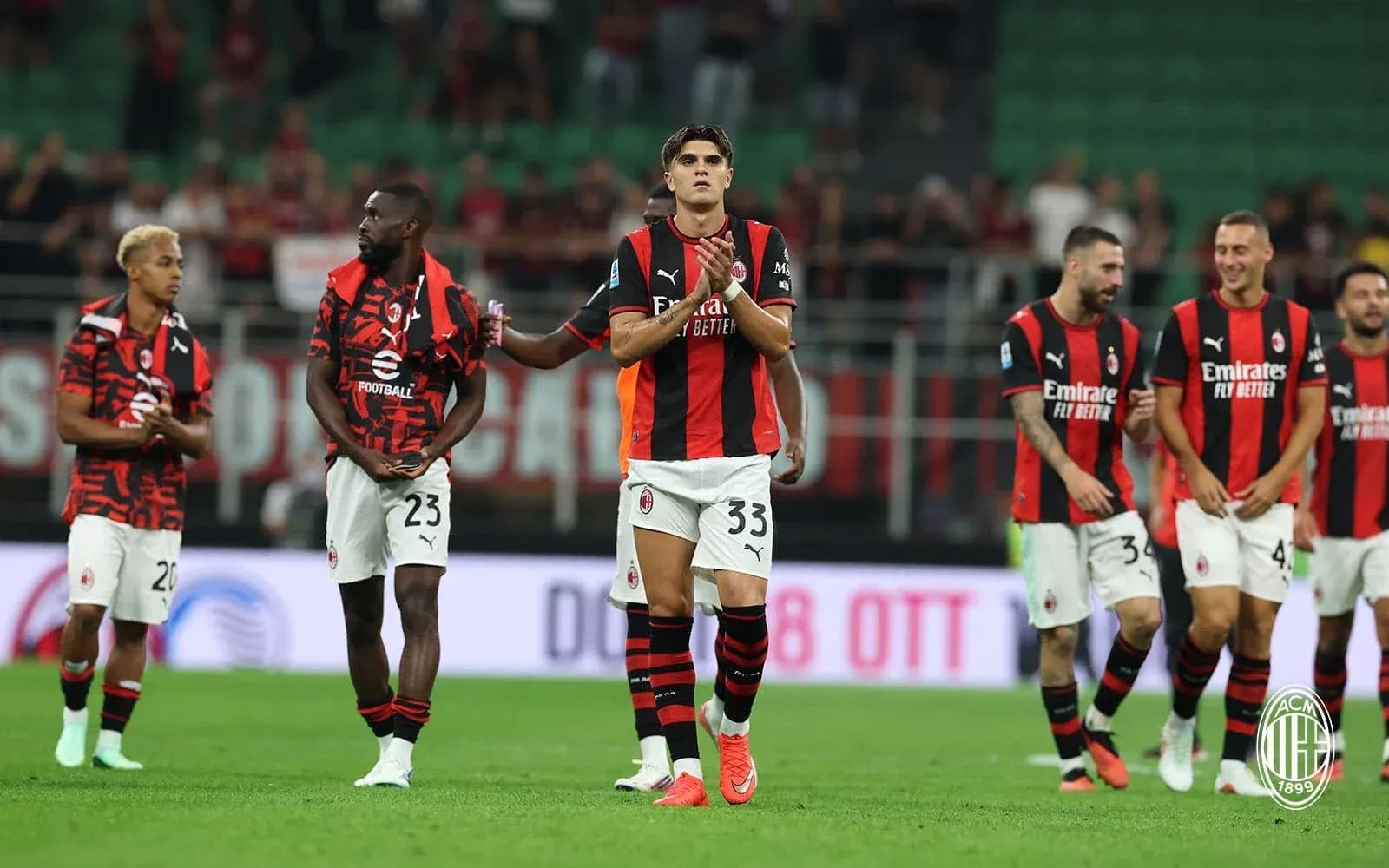 AC Milan players celebrating after the match