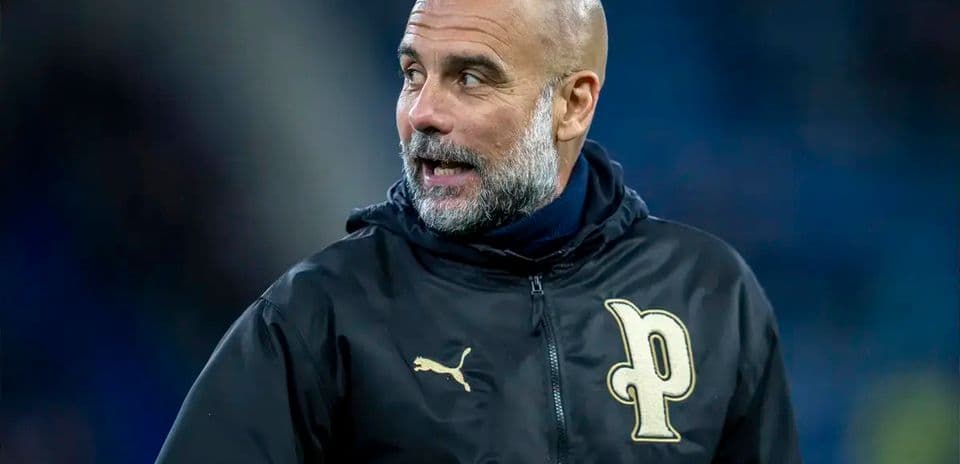 Coach wearing a jacket during training session