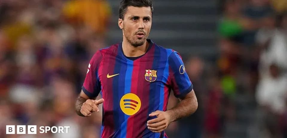 Barcelona player running on the pitch during match