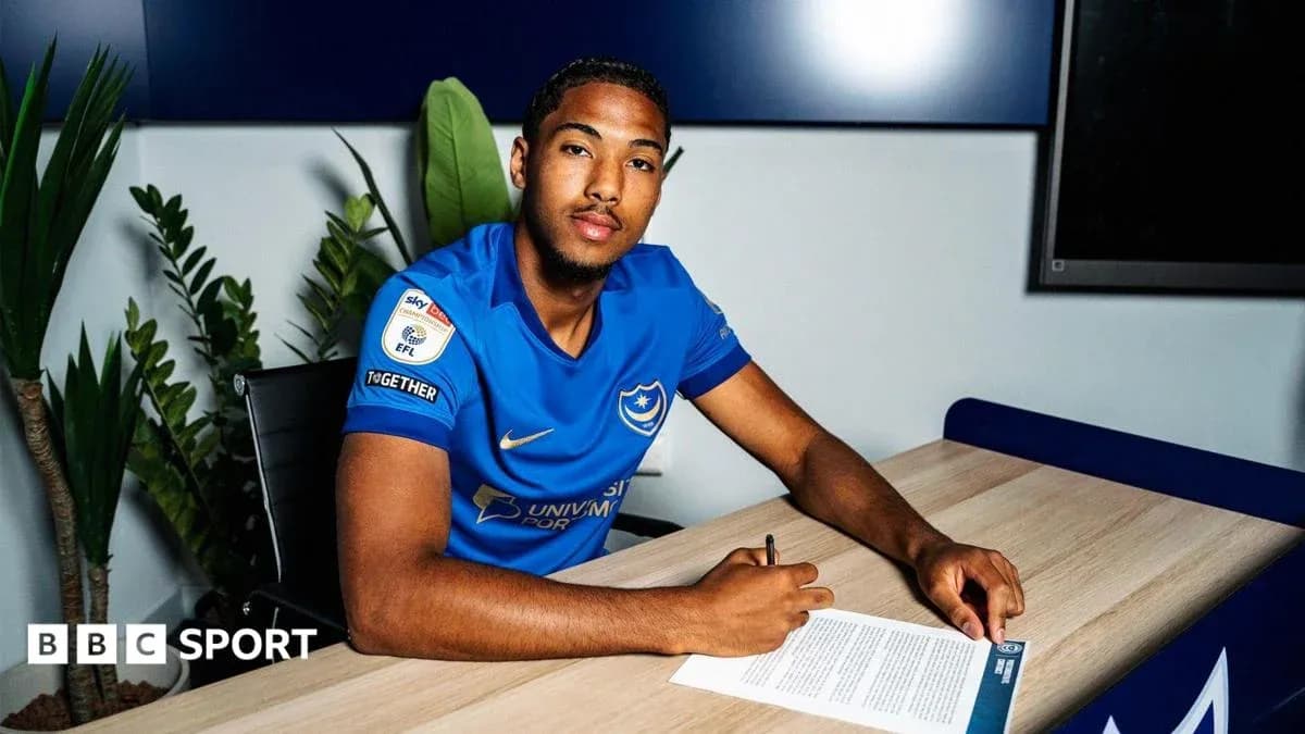 Player signing contract at Portsmouth club office