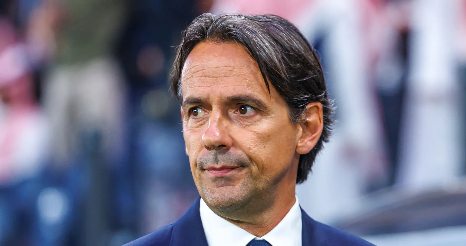 Football manager observing the match from sidelines